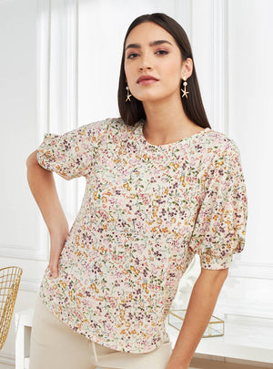 Floral print puff sleeve top front view on model
