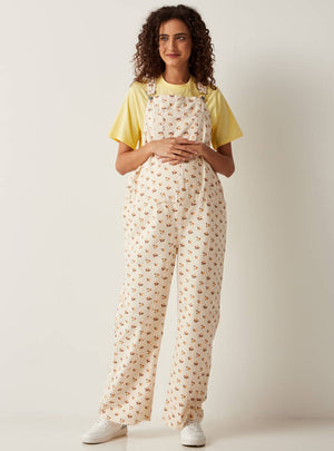 Max floral denim maternity dungarees front view on pregnant model