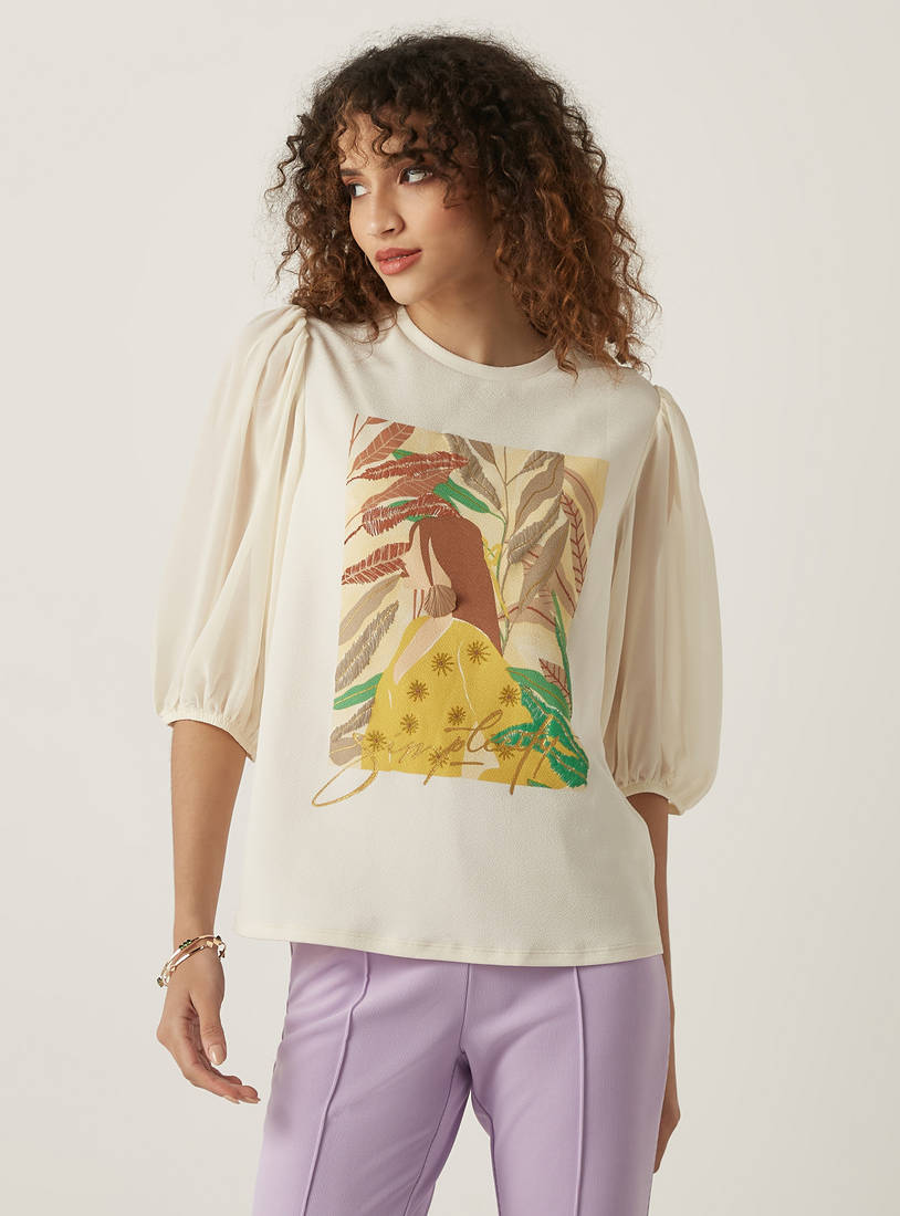 Max graphic print top back view on model