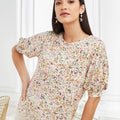 Floral print puff sleeve top front view on model