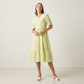 Max lime green gingham wrap dress front view on model