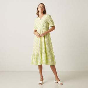 Max lime green gingham wrap dress front view on model
