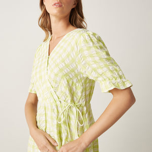 Max lime green gingham wrap dress back view on model