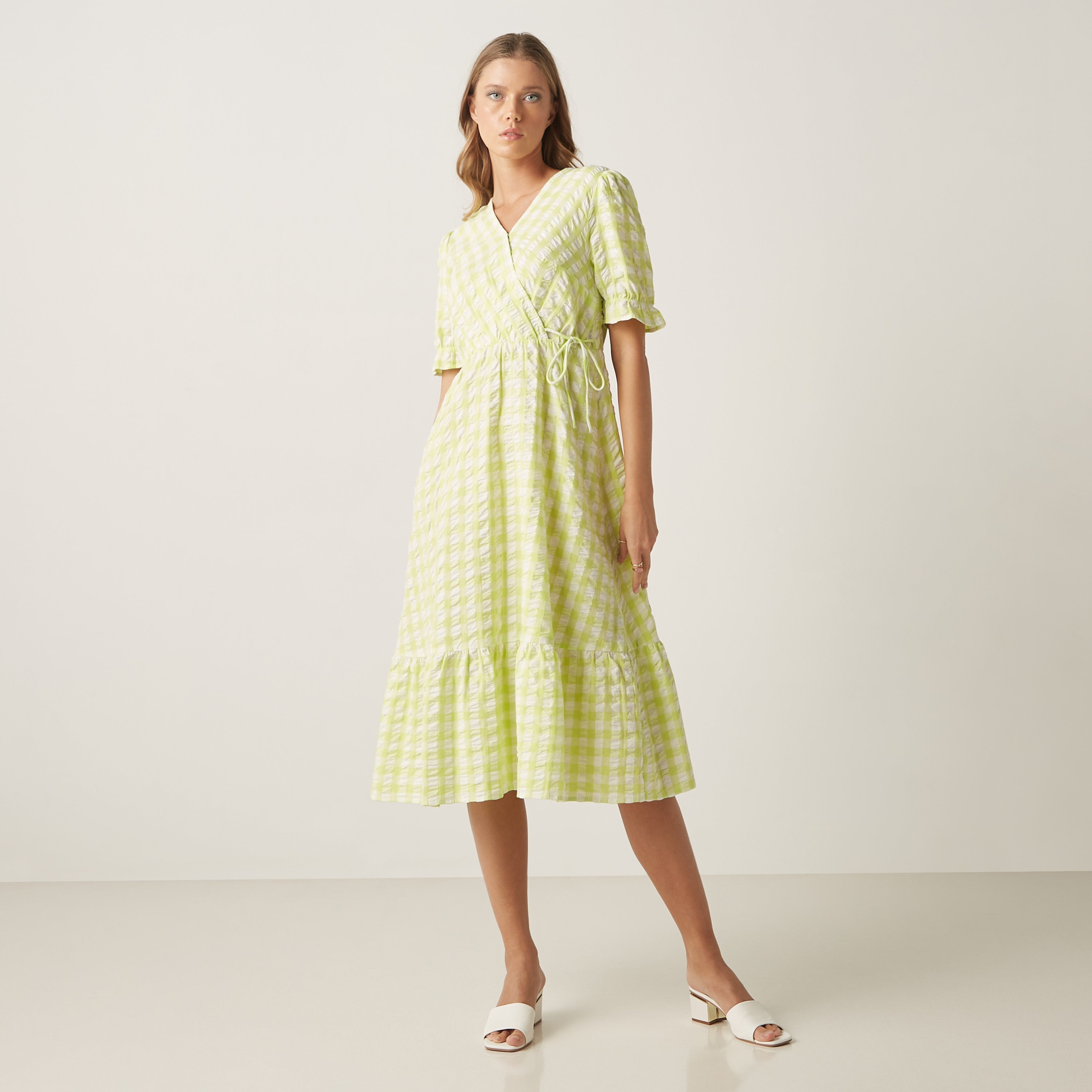 Max lime green gingham wrap dress close-up of V-neck wrap and tie-up waist detail