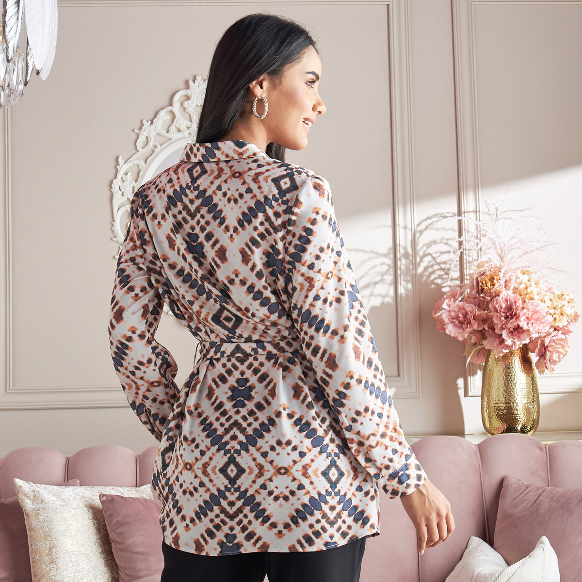 Max printed satin tunic lifestyle shot on model seated on pink sofa