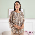 Max animal print pintuck top front view on model