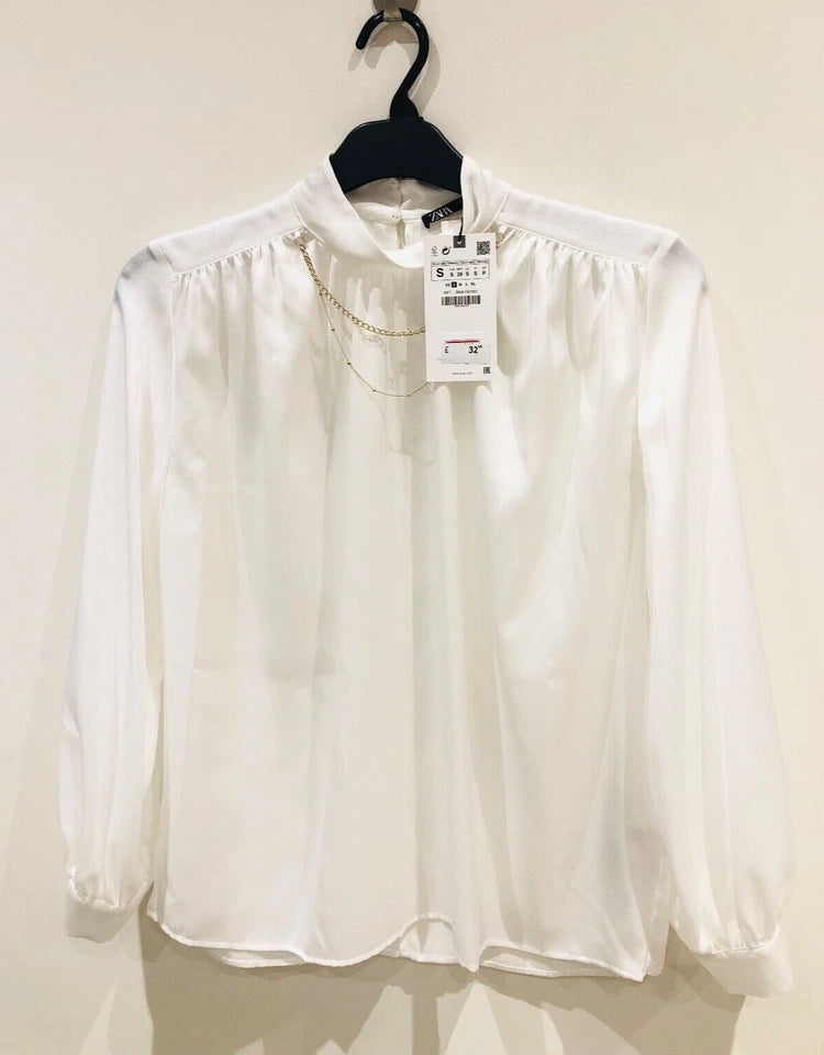 Zara white satin blouse chain necklace detail close-up